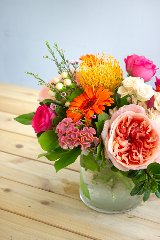 Bright and colourful floral arrangement. Photography by Vibeke Silverthorne, 2023