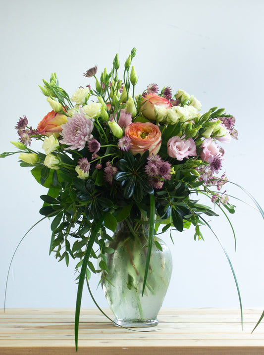 White, purple, and green floral arrangement. Photography by Vibeke Silverthorne, 2023